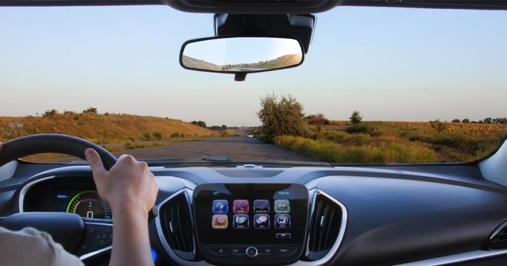 The view from inside a car of a drive in the country