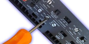 A screwdriver and an amplifier